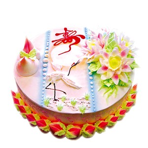 寿与天齐:祝寿蛋糕：整个蛋糕犹如放在莲花宝座之上，表面有一只仙鹤，两边为寿桃和寿花。